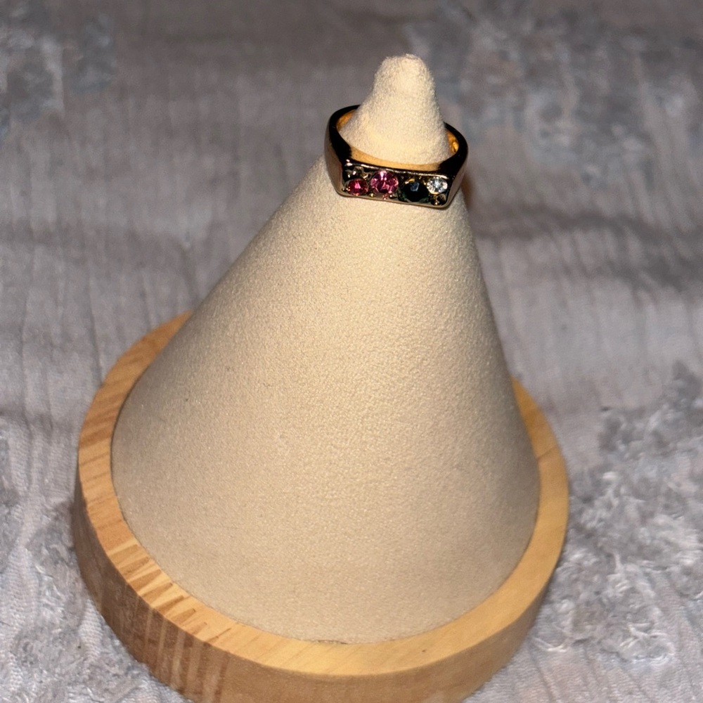 Gold ring with multi color stones